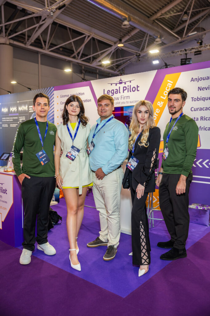 Legal Pilot team members posing at the SiGMA Central Europe conference booth